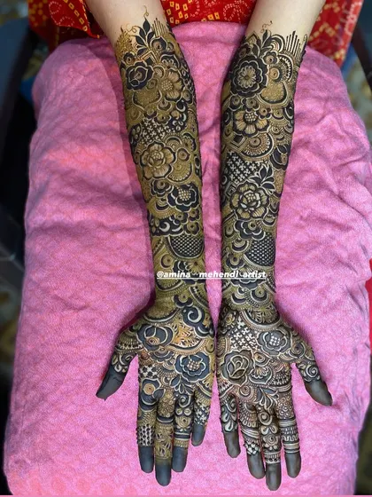 A beautiful design with a mix of dark, bold florals and lighter, more delicate patterns.