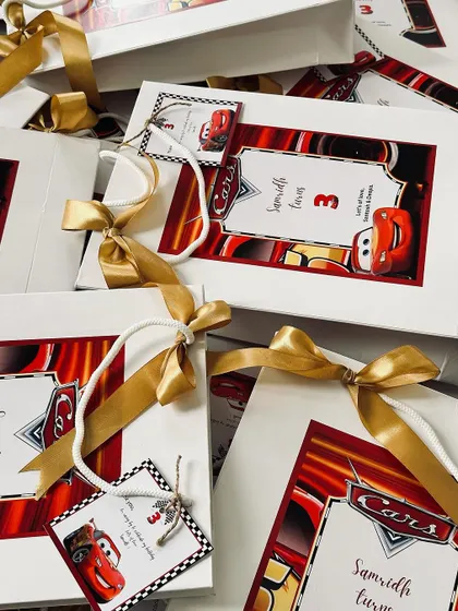 Each bag is carefully assembled with a rope handle and a personalized tag, adding a touch of quality to these fun party favours.