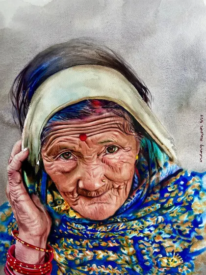 A closer crop of the "Wisdom in her eyes" portrait. This view allows a better appreciation of the fine details in the wrinkles, the bindi, and the texture of the headscarf.