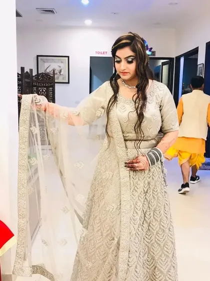 Another client wearing the ivory chevron lehenga, showing its versatility and appeal.