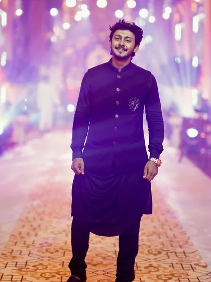 Another shot of the black Indo-Western, showing its unique silhouette and comfortable fit, even for a long awards night.