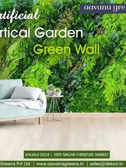 A breath of fresh design. We brought the outdoors in with this beautiful artificial green wall, creating a vibrant and refreshing backdrop for the living room sofa.