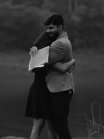 A simple, powerful hug captured in black and white. This pre-wedding shot strips away all distractions, focusing solely on the emotional embrace between the couple.