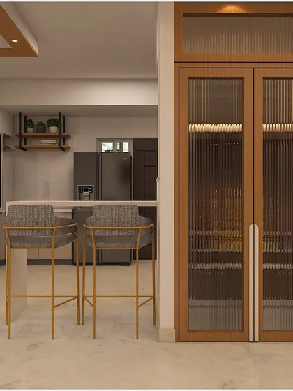 The fluted glass doors of the pooja unit when closed, offering a glimpse of the sacred space within while maintaining a clean and uncluttered look in the hallway.