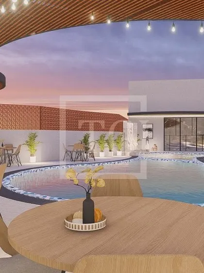 This render shows the poolside dining area for the Bhubaneswar hotel project. The design features a mix of seating arrangements under a large, modern pergola, with string lights adding to the warm and inviting ambiance for evening service.