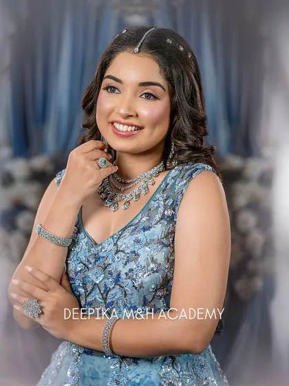 A portrait of the model looking bright and cheerful. The makeup is soft and pretty, letting her natural beauty and smile shine through.