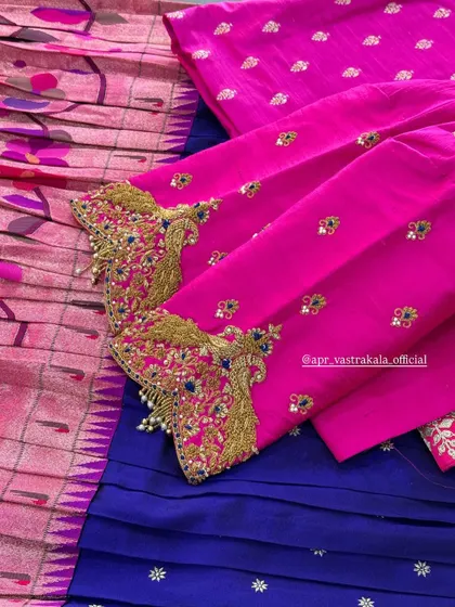 Another view of the pink and blue embroidered sleeves.