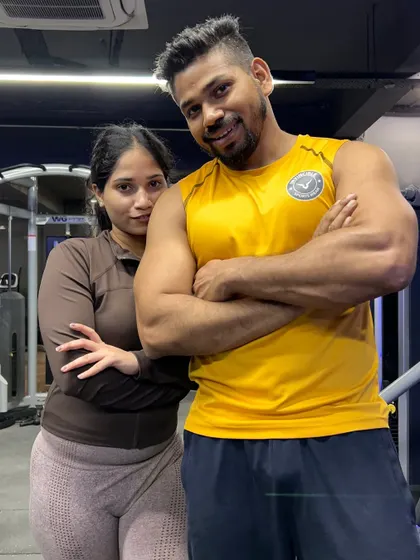 Posing together after a tough workout. It's all about having fun and supporting each other.