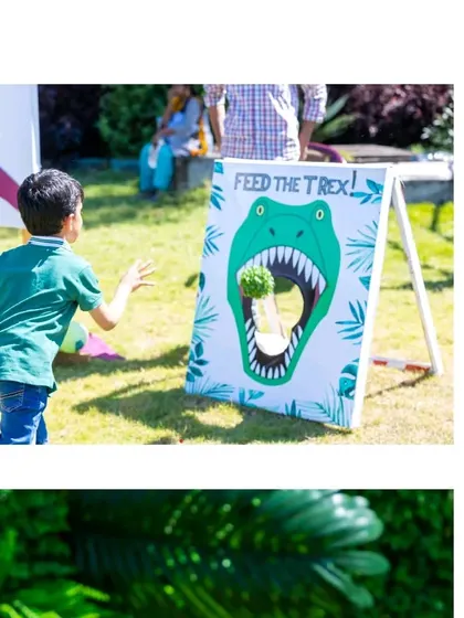 A 'Feed the T-Rex' bean bag toss game, one of the many themed activities I designed for the dinosaur party.