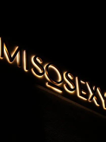 A close-up of the glowing 'MISOSEXY' sign, an example of how I capture the branding and unique details of an event venue.