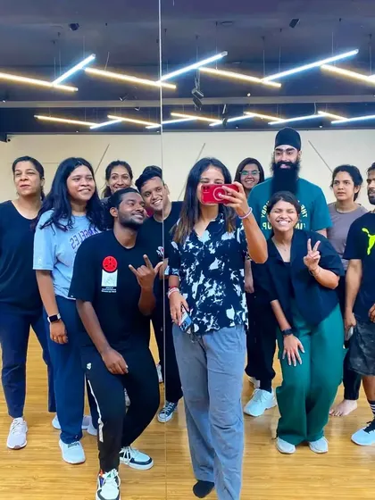 A mirror selfie with the crew. Every class is a chance to connect, grow, and have fun with our amazing students and mentors.