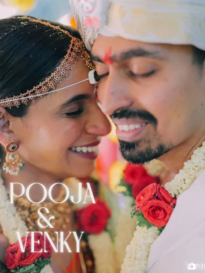 A beautiful close-up of Pooja and Venky, capturing their smiles and the traditional details of their wedding attire.