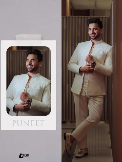 A cheerful portrait of groom Puneet, looking sharp and happy in his white bandhgala for the Roka.