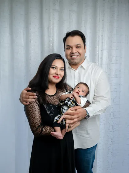 A beautiful family portrait, celebrating their new arrival. We style our sessions to feel classic and timeless.