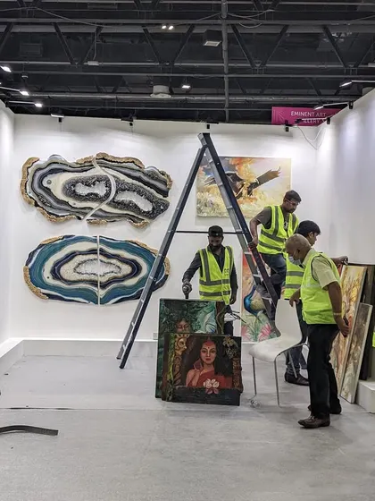 Behind the scenes at an art exhibition. My team is essential in setting up these large, heavy resin pieces so they can be enjoyed by everyone.