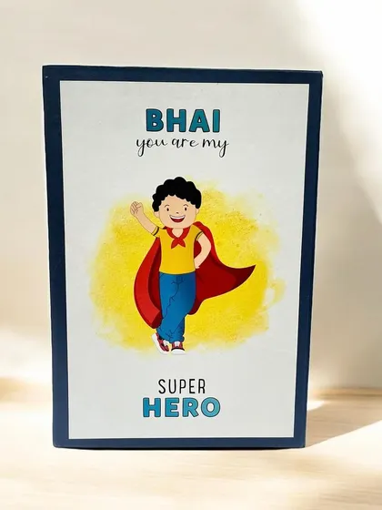 A sweet and simple gift box with a card that reads "Bhai you are my Super Hero." It's a perfect way to express your love and admiration for your brother on Rakshabandhan or his birthday.