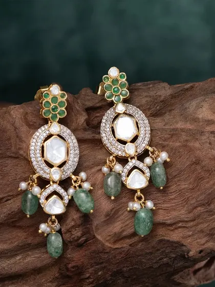 A duplicate image of the elegant drop earrings, showing the beautiful combination of kundan, diamonds, and green beads from a slightly different angle.