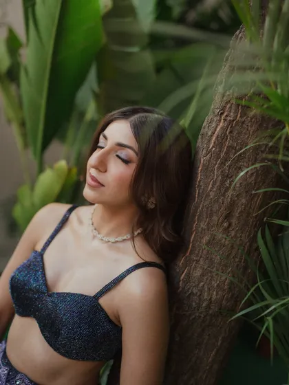 A serene close-up of Sheena's Sangeet makeup. The soft, shimmery eyeshadow is blended perfectly for a look that is glamorous yet sophisticated.