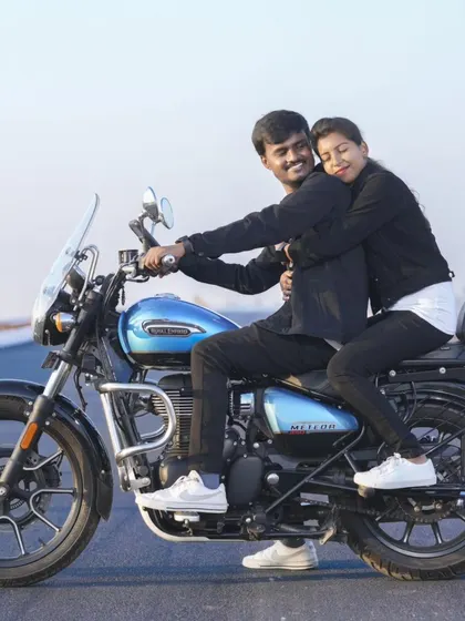 A happy and carefree moment on a motorcycle. This is perfect for couples who share a love for adventure and the open road.
