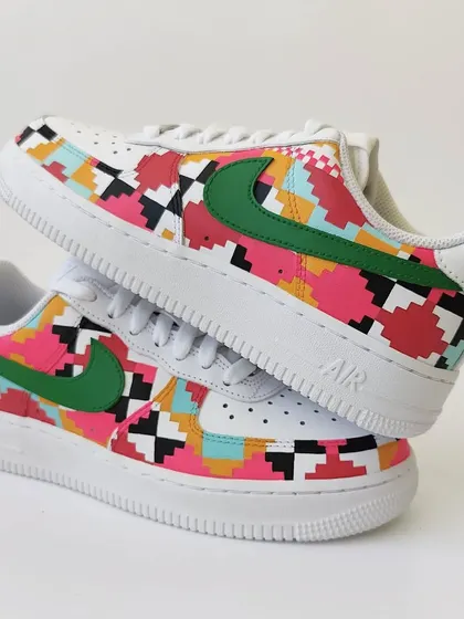 A stacked view of the Dhurrie weave custom Nikes. The pattern is continuous and wraps around the shoe, creating a seamless piece of wearable art.