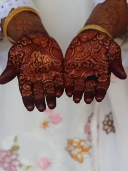 A close-up of the palms, where the stain is always the darkest. The details of the design are still perfectly clear in the deep stain.