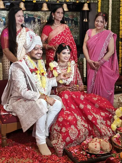 From Sri Sri University to Saat Phere, Vishal and Neha's journey is a beautiful story of love. Here they are with their family, celebrating their union at the sacred Mahalaxmi Mantap in the Bangalore Ashram.