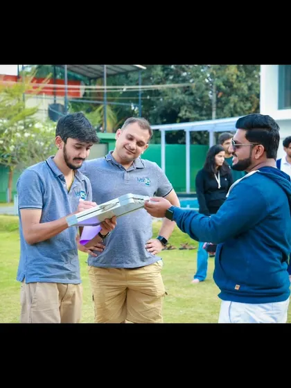Getting a signature from a participant. It's the small, personal interactions that help build a strong connection with the audience.