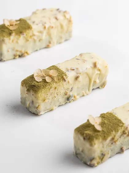 These Pistachio-Passionfruit Cake Bars are a perfect addition to any dessert hamper. They are egg-free and have a wonderful balance of flavors.