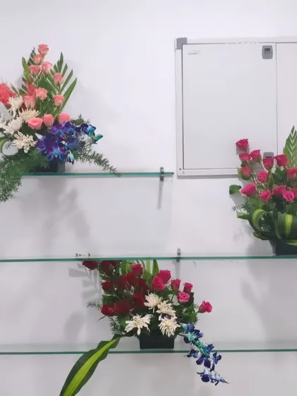 Another view of the flower boutiques, showing different styles and color combinations.