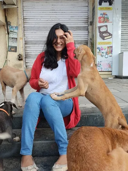 The best celebrations are the ones that are full of happy chaos and wagging tails. This candid moment was captured right after I was certified, surrounded by a group of curious and playful street dogs who joined the party.