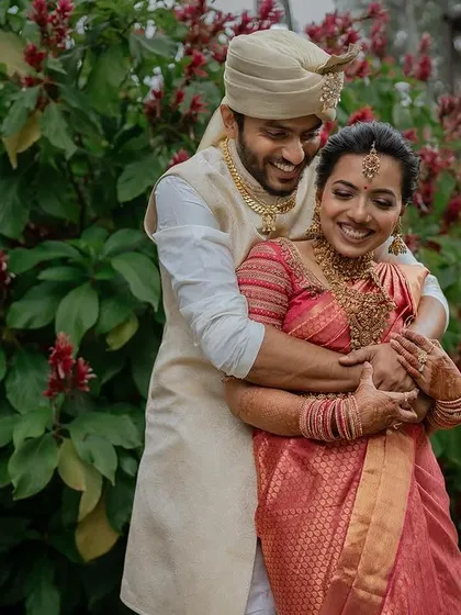 A gentle moment of affection against a backdrop of lush greenery. We love creating these serene and intimate couple portraits that you will cherish for a lifetime.