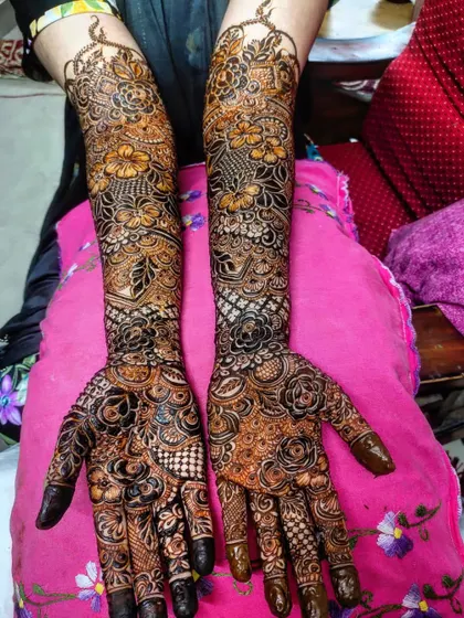 This view highlights the beautiful symmetry and complexity of the full bridal design.