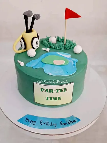 It's Par-Tee time! A fun golf themed cake with a putting green, water hazard, and a bag of clubs.