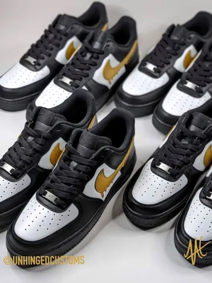 An army of Budweiser customs. I made four identical pairs for this corporate order, each with the same clean black, white, and gold design.