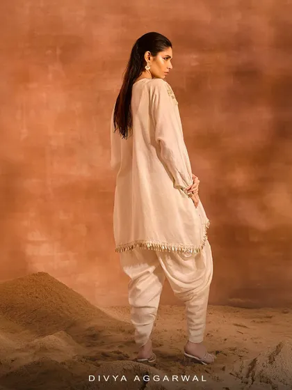 The back view of the Orion Kaftan Set, showcasing the fluid drape of the fabric and the unique silhouette of the dhoti pants.