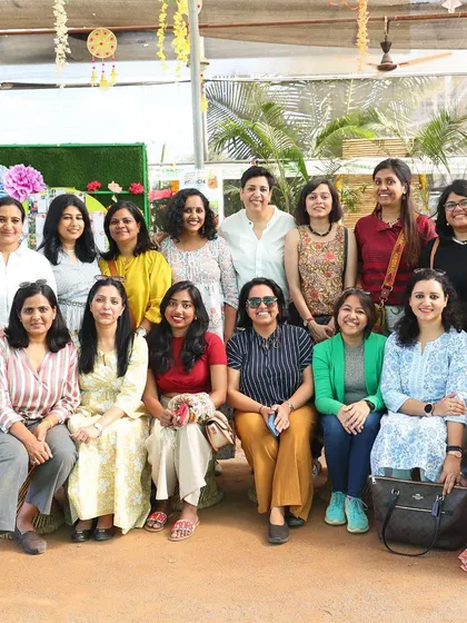 A group photo of the wonderful creators who attended the meet and greet. My garden provides a vibrant and natural setting for memorable group events and photos.