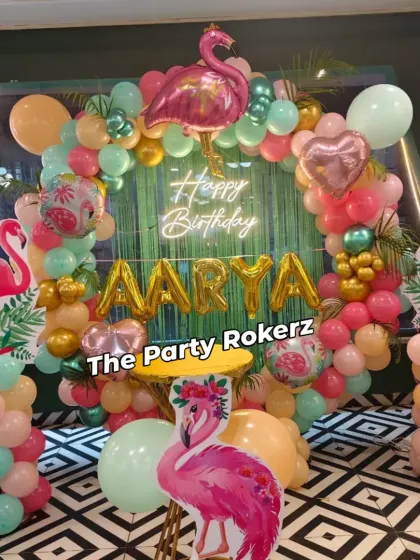 A Flamingo-themed party is a stylish and fun choice. I use a mix of tropical colors, flamingo cutouts, a green fringe backdrop, and a neon "Happy Birthday" sign to create a trendy, tropical vibe for the celebration.