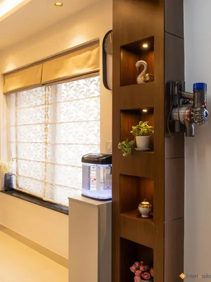 A shot showing how we integrate functional items like an aquarium and a vacuum cleaner dock into the overall design in a discreet and stylish way.