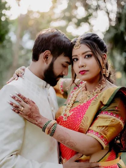 A portrait where the bride looks towards the camera, sharing her moment with the viewer. It's a beautiful way to capture confidence and love in a single, powerful image.