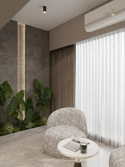 A serene nook that blends minimalism with natural warmth. The muted taupe and grey palette forms a grounding base, while earthy stone textures and matte finishes lend a raw elegance. The curved archway and patterned seating add a cozy softness.