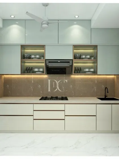 A straight-line kitchen layout designed for efficiency and style. We used a combination of mint green and white high-gloss laminates, paired with a marble-patterned backsplash and under-cabinet lighting to create a bright and airy cooking space.