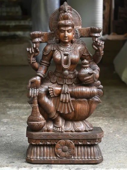 A 36-inch sculpture of Goddess MahaLakshmi, also known as Uma Devi, holding pots of wealth. This form emphasizes her role as the bestower of abundance and prosperity.