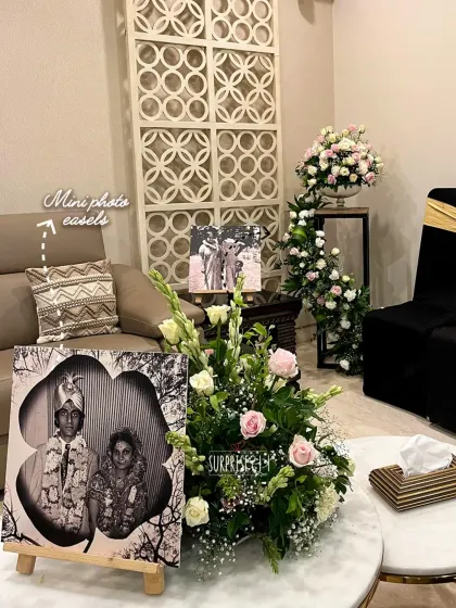 We love incorporating personal photos into our decor. For this 50th anniversary, we placed cherished memories on mini easels around the room, creating conversation starters and moments of reflection for the family.