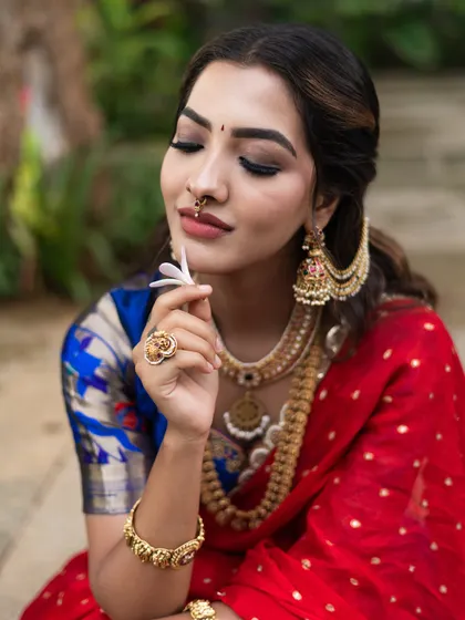 A beautiful smoked eye look with a hint of tradition. This close-up shows the perfect blend of a modern smokey eye with traditional jewellery and attire.