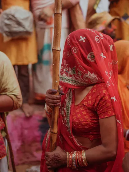 A comprehensive photo series from Lathmaar Holi in Barsana. These images document the unique tradition where women playfully hit men with sticks, recreating a legend of Lord Krishna and Radha. The photos are filled with motion, color, and raw emotion.