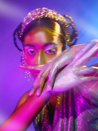 An abstract beauty shot using motion blur and colored gels to create a dreamy, energetic effect.