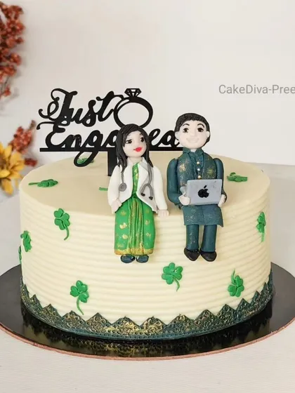 I love creating personalized toppers, like these for a doctor and an IT professional. This engagement cake features a green vanilla sponge to match the theme, all covered in a smooth chocolate ganache.