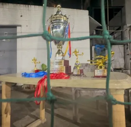 The trophies for the U13 Super Cup waiting to be awarded. They represent the prize for dedication and hard work.