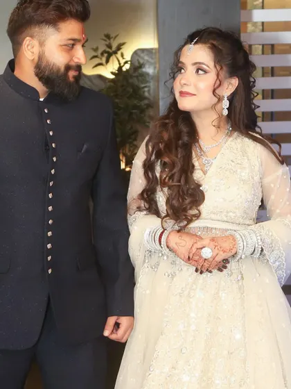 The couple sharing a look, a candid moment that feels full of love and happiness.