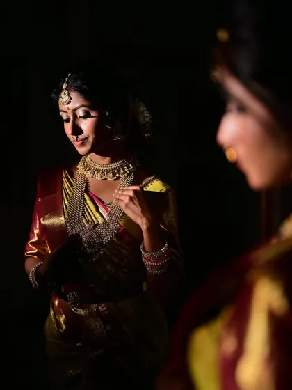 A duplicate of 104, this artistic shot again demonstrates the versatility of the makeup look, appearing flawless even in unconventional framing and dark lighting.